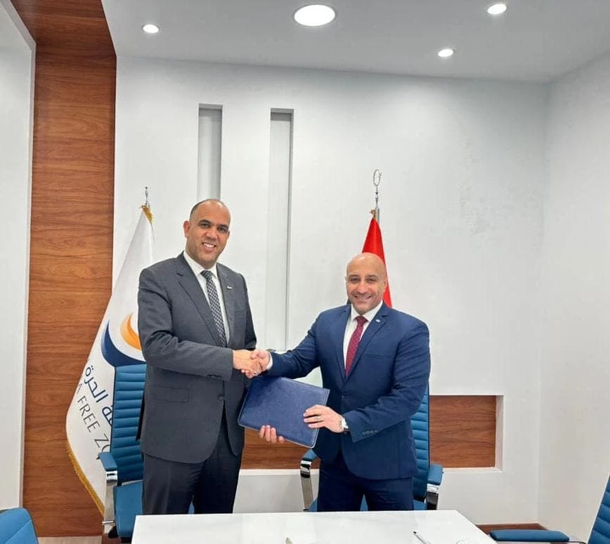 Cooperation agreement between the Ports Training Institute and the Free Zone in Misratah to organize an international conference in the field of ports and free zones.2