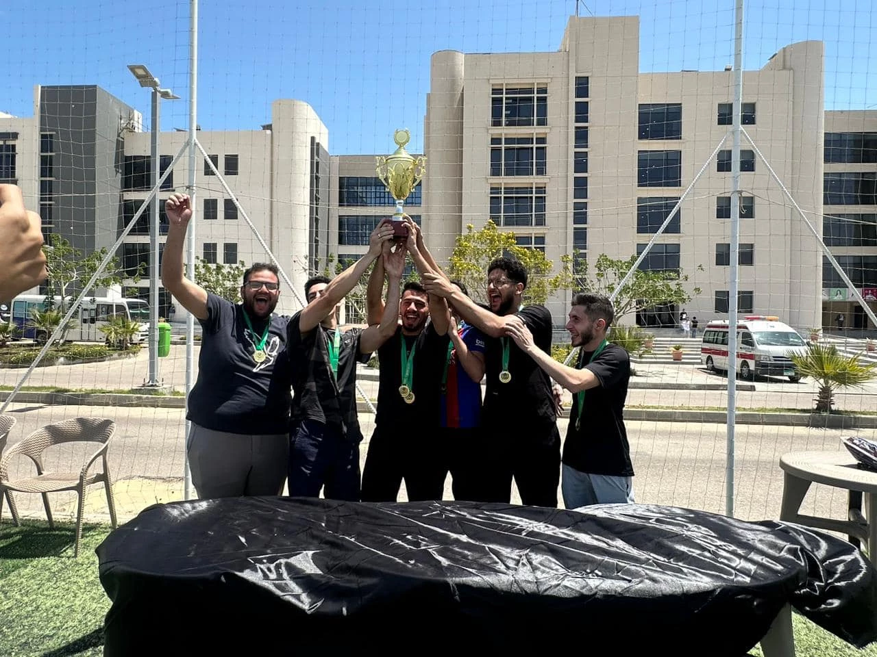 Celebrating the students who won the five-way football league at the Al-Alamein branch.3