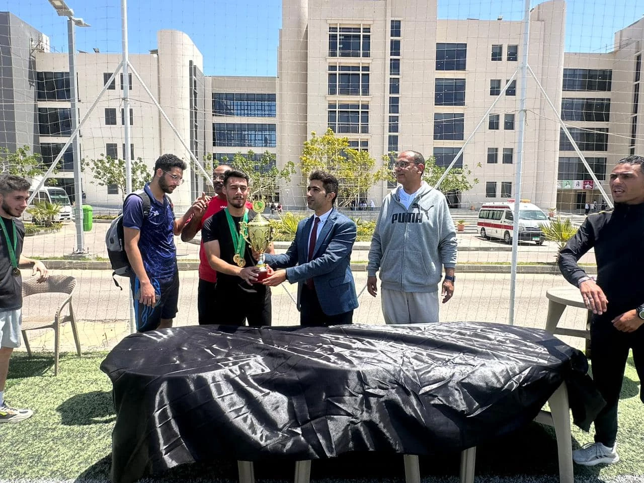 Celebrating the students who won the five-way football league at the Al-Alamein branch.3