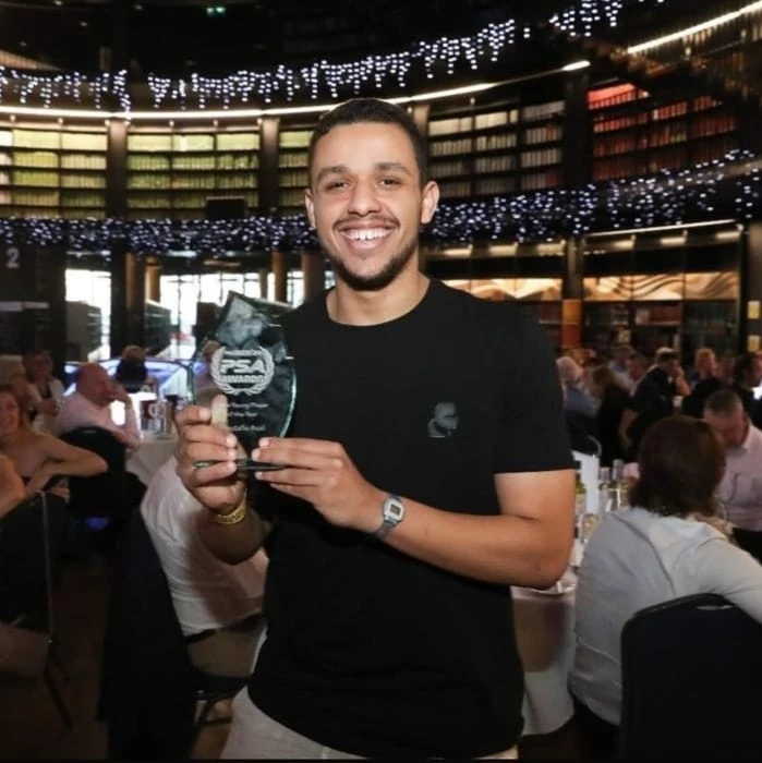 Mustafa Assal, son of the Academy, wins the best young player award for 2024 from the professional squash players association