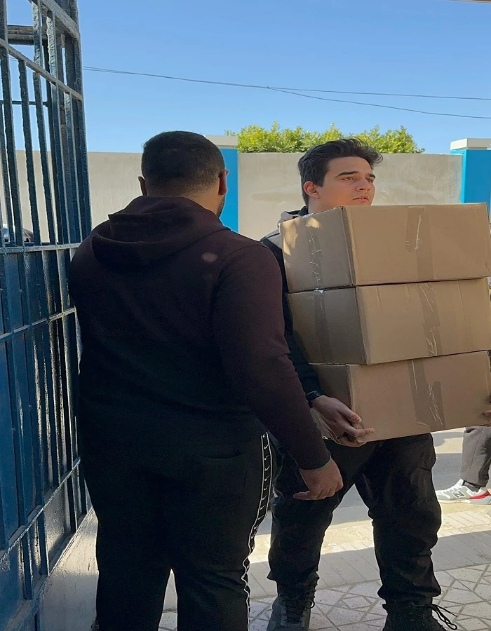 The Deanship of Student Affairs gathered and mobilized students from all students to distribute Ramadan boxes to the people working at Target and cleaning companies, as well as the distribution at the Abu Qir Youth Center on 3/12/2024.10