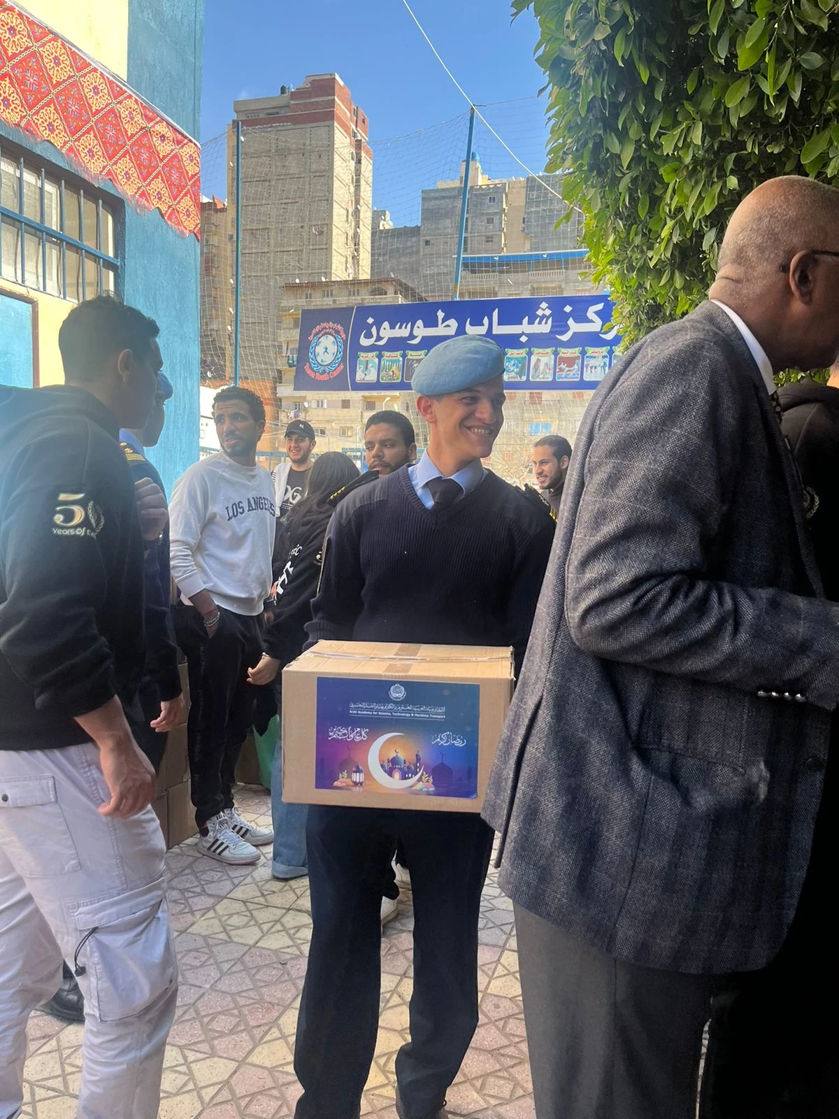 Participation of students from the College of Maritime Transport and Technology in distributing charity bags before the beginning of the holy month3